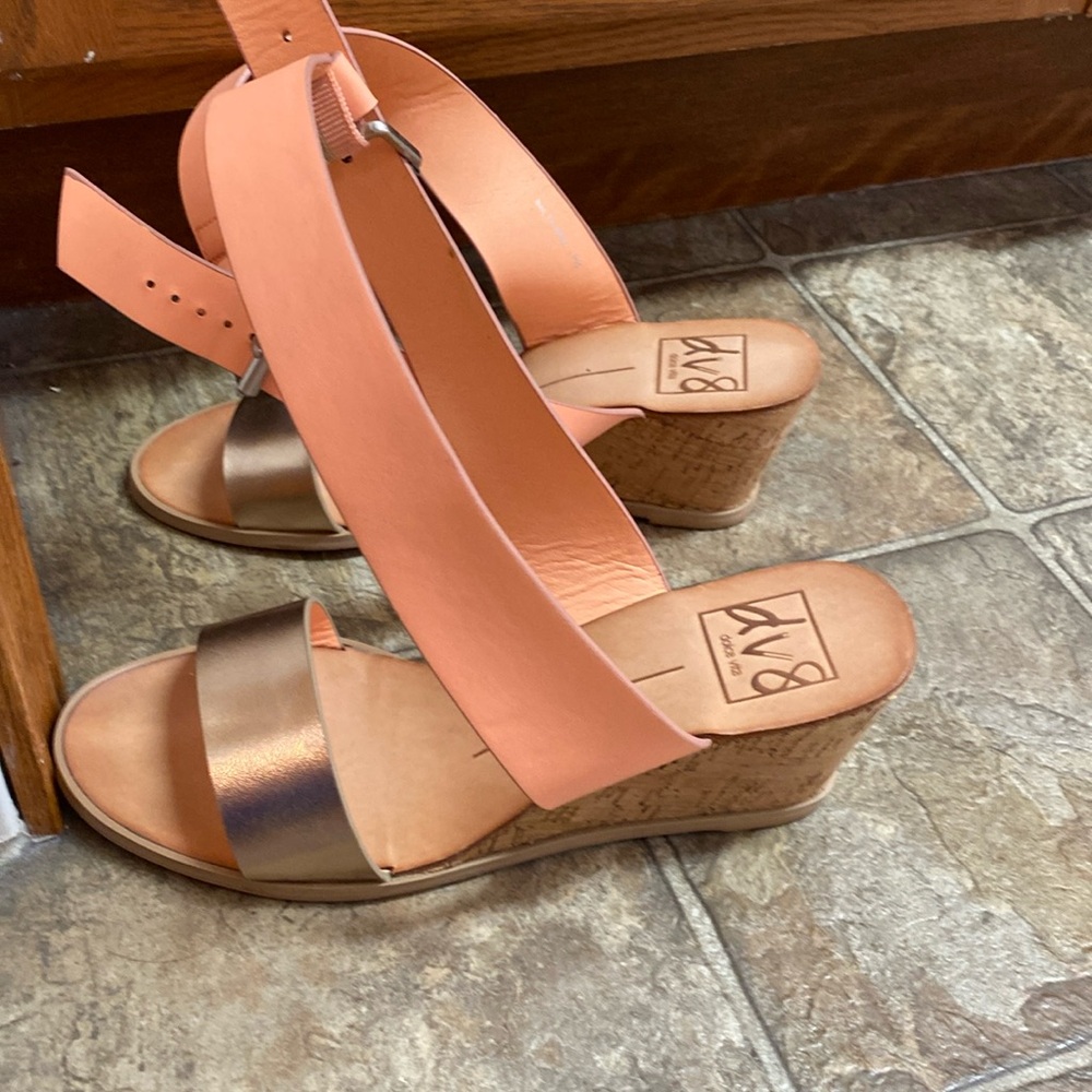 Peach stappy wedge sandals.